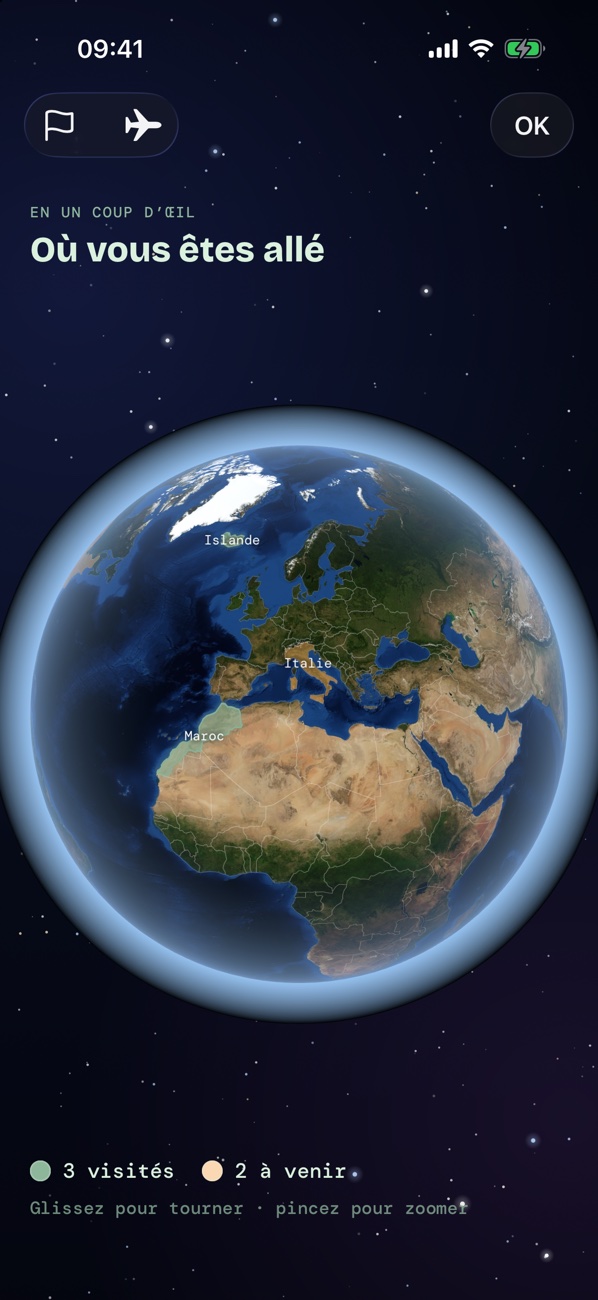 Le globe avec les pays visités colorés et un avion en route vers l’Islande